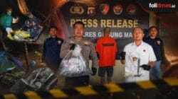 Petugas Polres Gunung Mas menunjukkan barang bukti saat press release pengungkapan kasus pembunuhan di Tewah, di kawasan pendulangan emas Sungai Barou. Foto. Ist