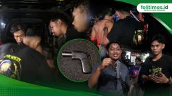 Proses pengamanan seorang pria yang diduga membawa benda menyerupai senjata api di kawasan Mendawai, Kota Palangka Raya. Foto Istimewa.